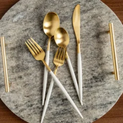 Mazzy Gold Satin White Pom Handle 20-Piece Flatware Set